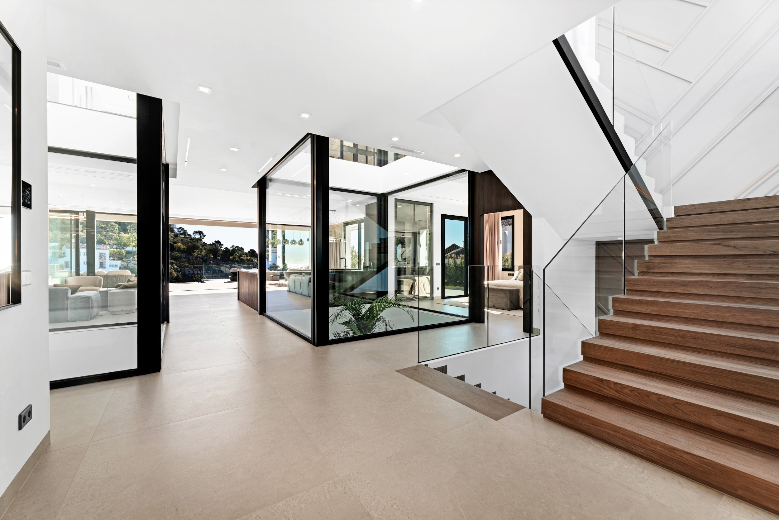 Hall with staircase and courtyard
