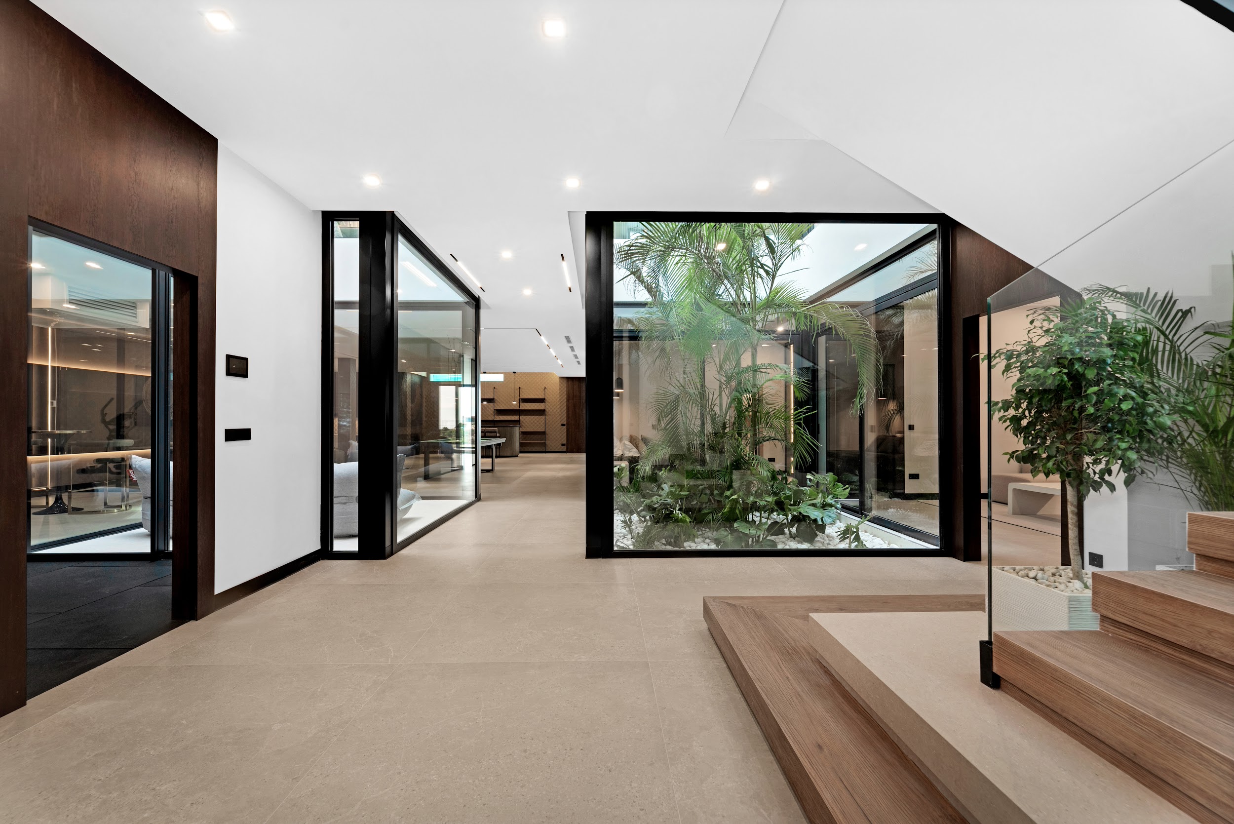 Corridor and tropical courtyard