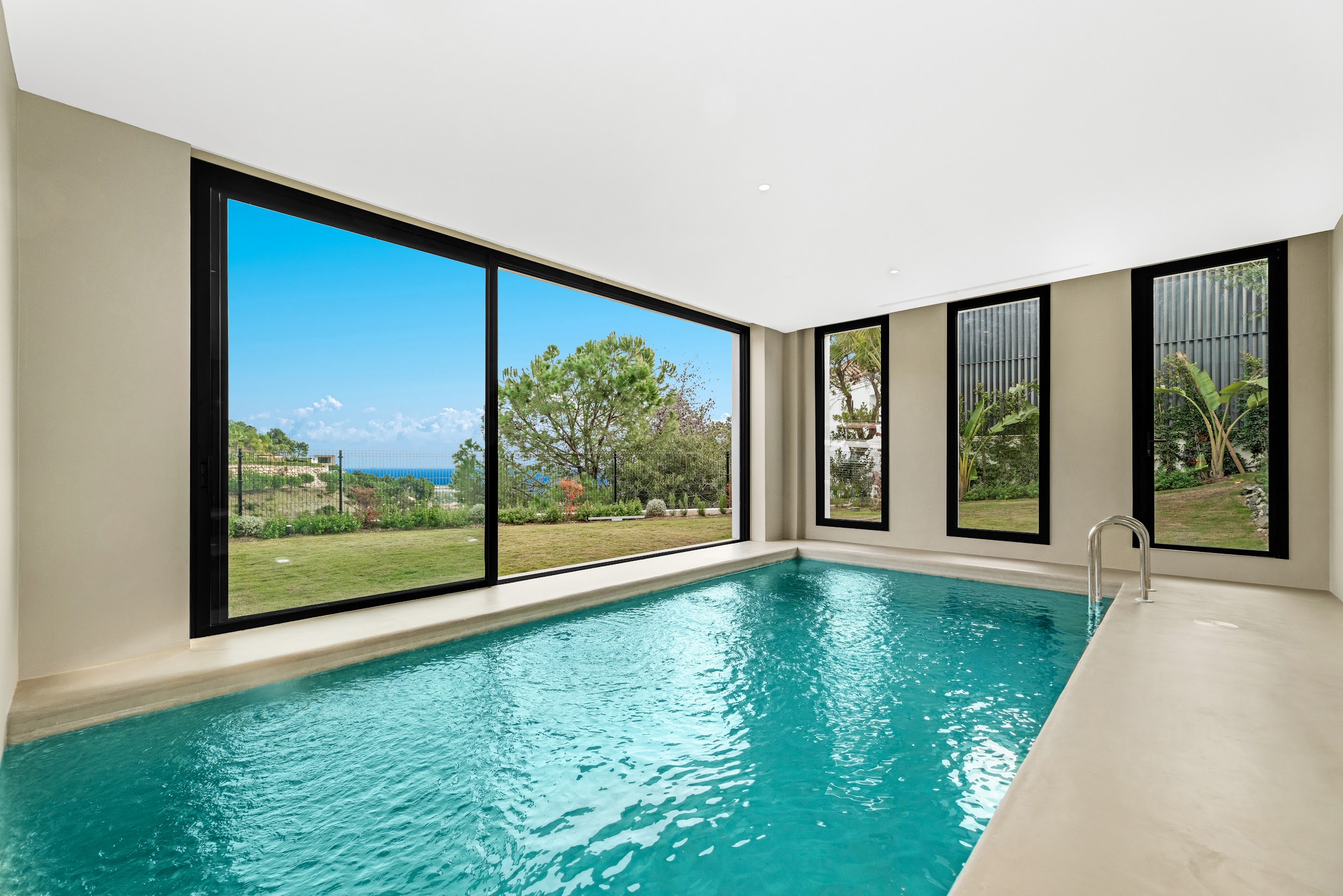 Indoor pool with large windows