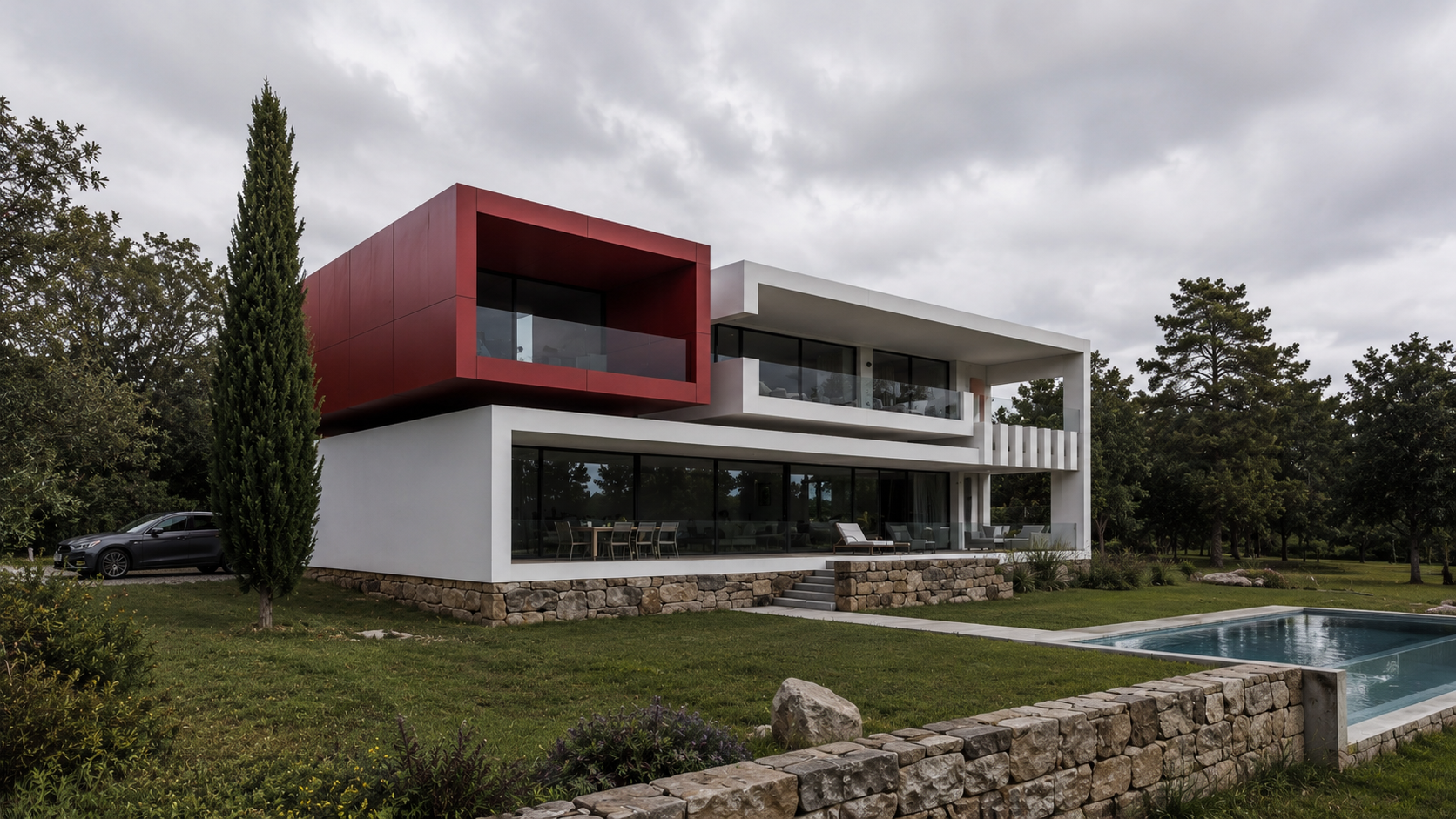 Santos Concept II — villa de diseño con volumen rojo y piscina, Costa del Sol